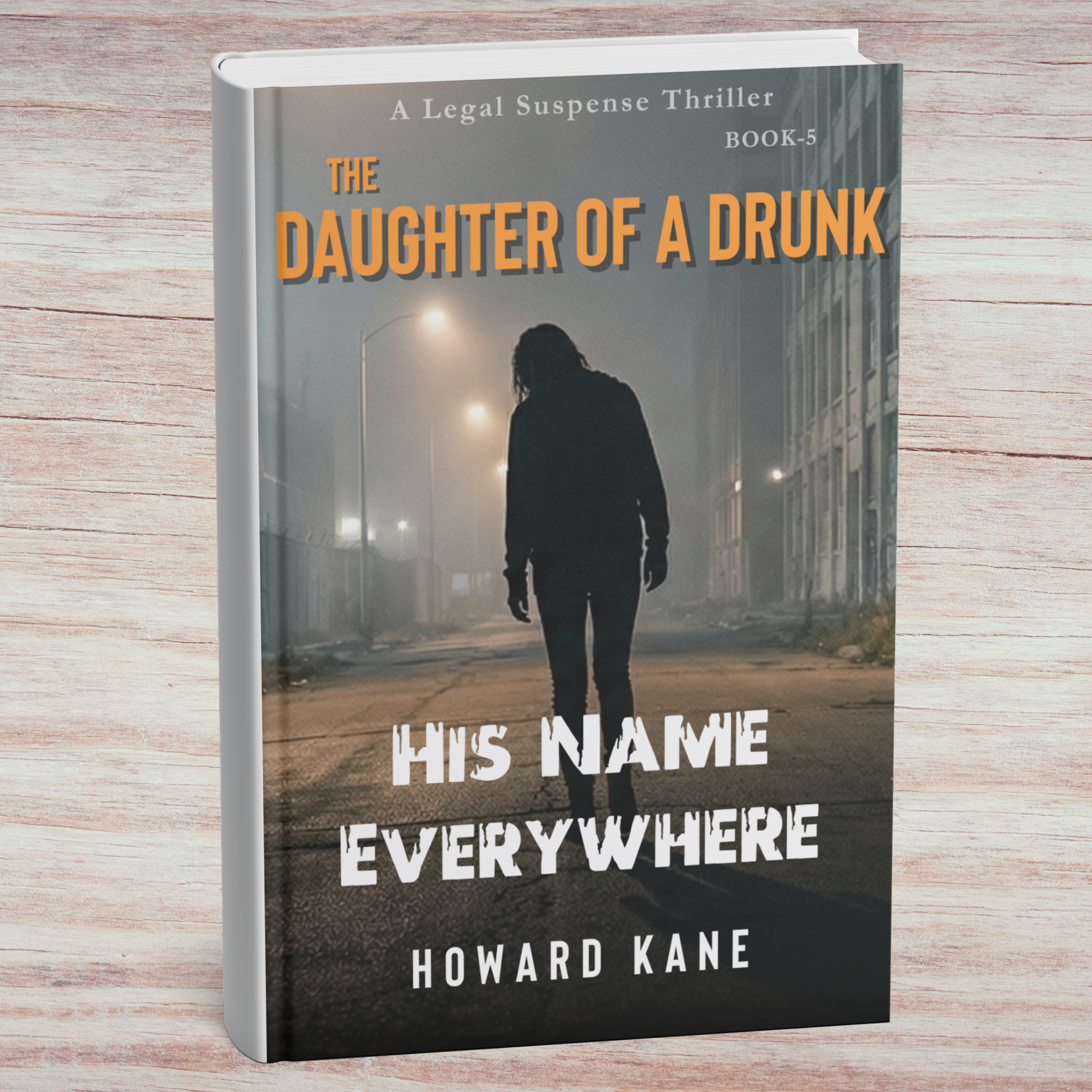 Book titled 'The Daughter of a Drunk: His Name Everywhere' by Howard Kane on a wooden surface