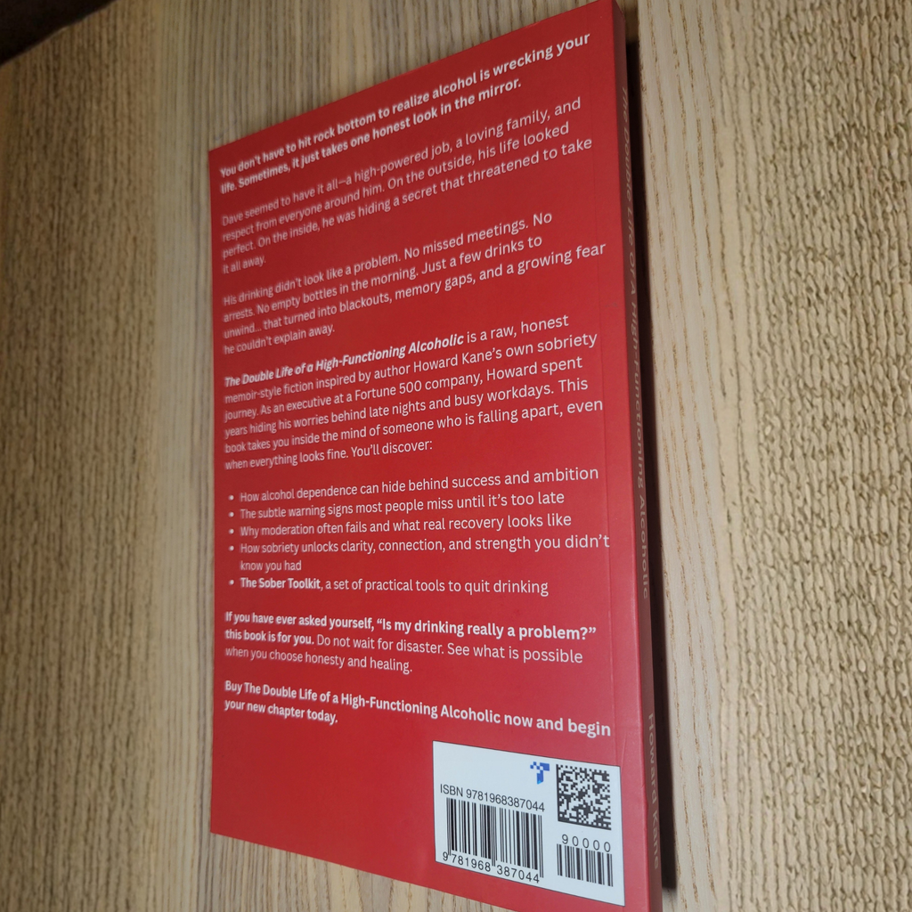 Back cover of a book with text and a barcode on a wooden surface