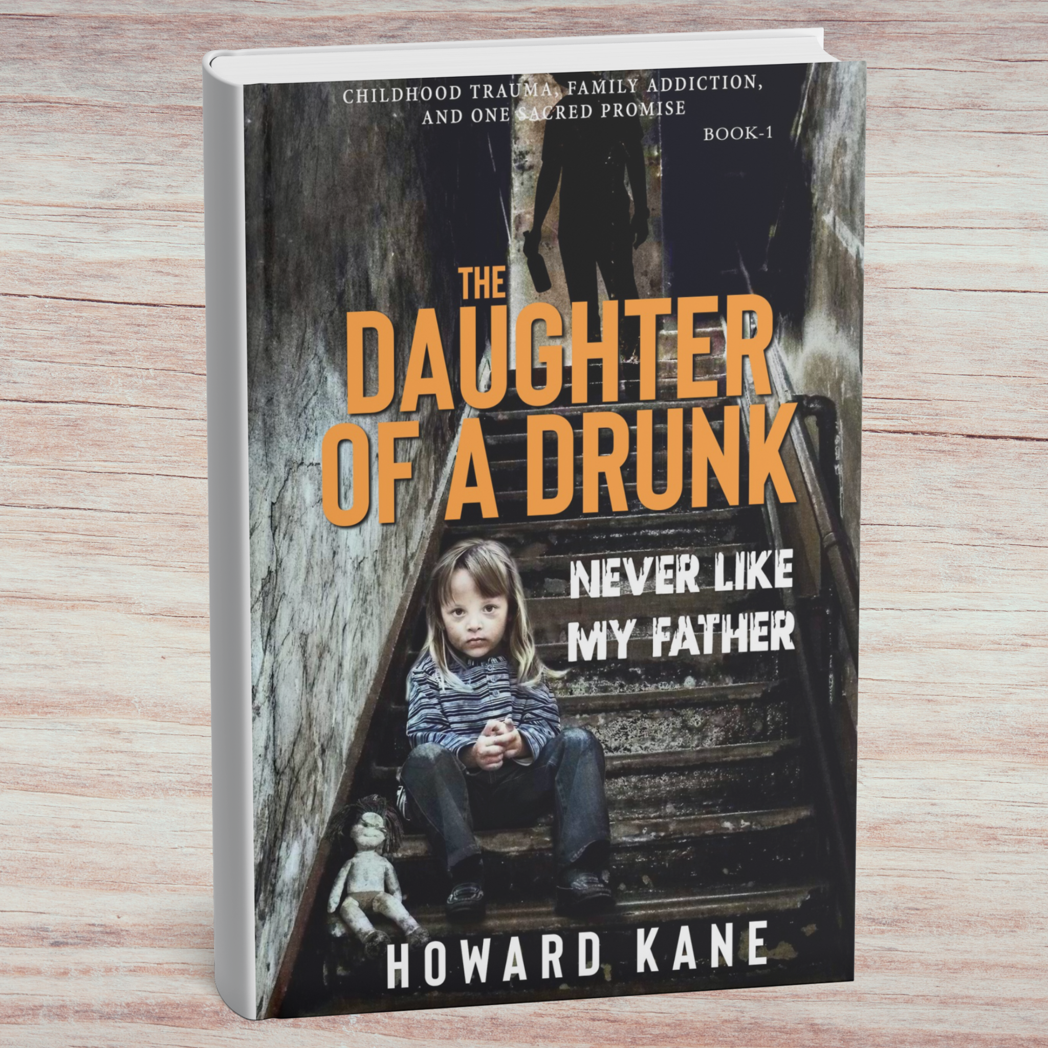 Book titled 'The Daughter of a Drunk Never Like My Father' by Howard Kane on a wooden surface