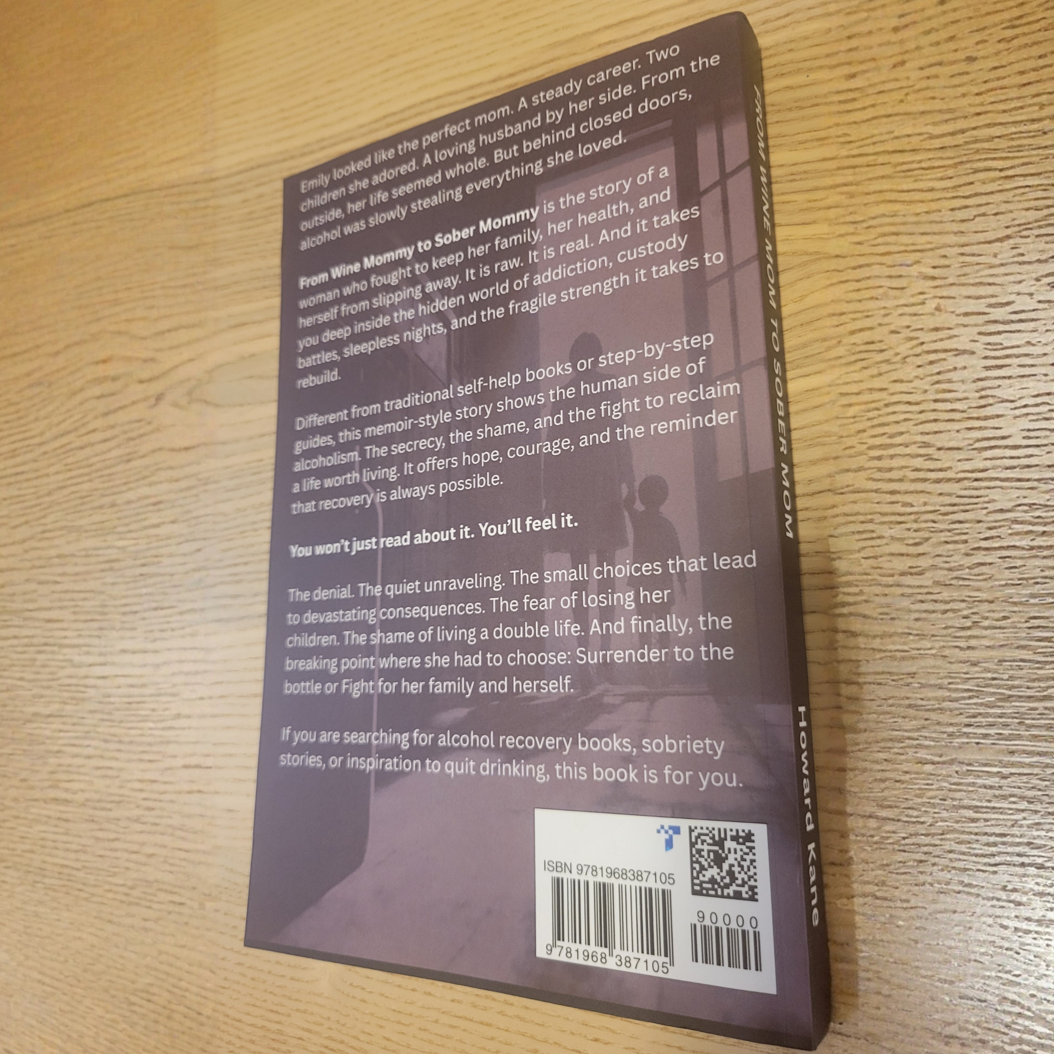 Back cover of a book on a wooden surface